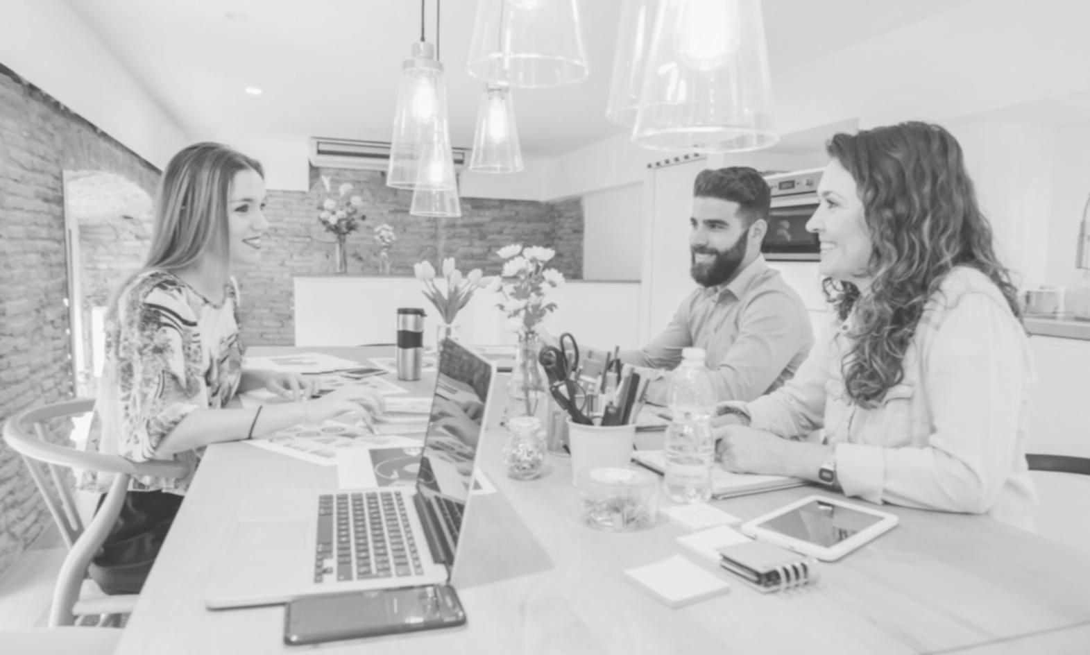 Financial planning session with entrepreneur reviewing budget documents